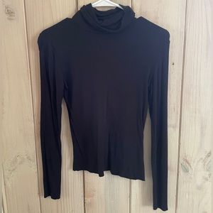 Black turtle neck.